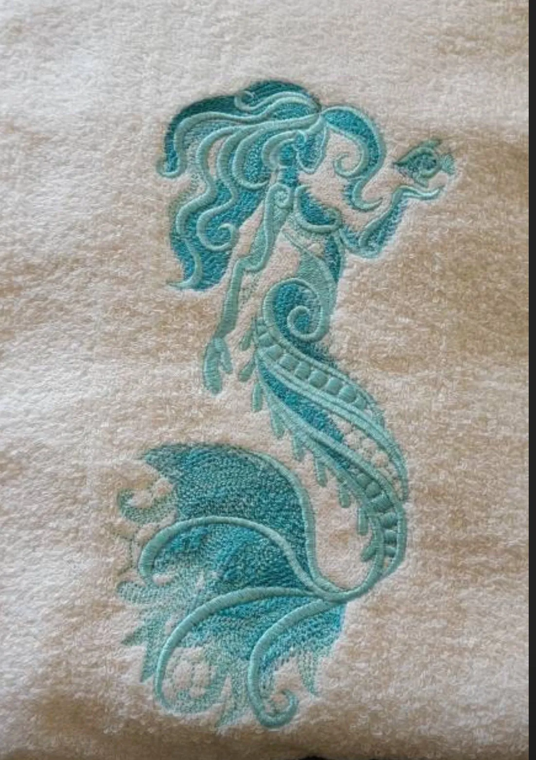 Embroidered Mermaid Hand Towel. Gorgeous Mermaid embroidered in beautiful ocean colors.  Add a touch of coastal luxury to any bathroom.